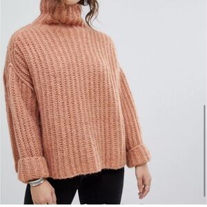 Free People Fluffy Fox Turtleneck size small/ papaya orange